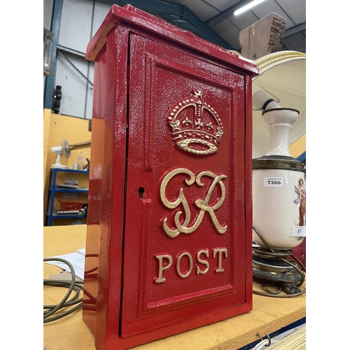 56 - A RED WALL MOUNTED GR POST BOX WITH KEYS