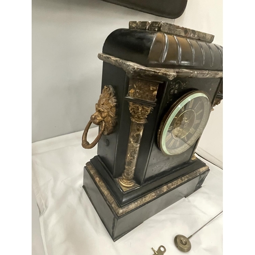6 - A HEAVY SLATE AND MARBLE MANTLE CLOCK WITH ENGRAVED FLOWER DECORATION AND LION HANDLES TO THE SIDE S... 