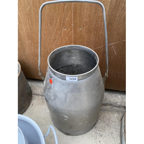 1254 - A STAINLESS STEEL MILKING BUCKET AND TWO METAL MILK CHURN SIEVES