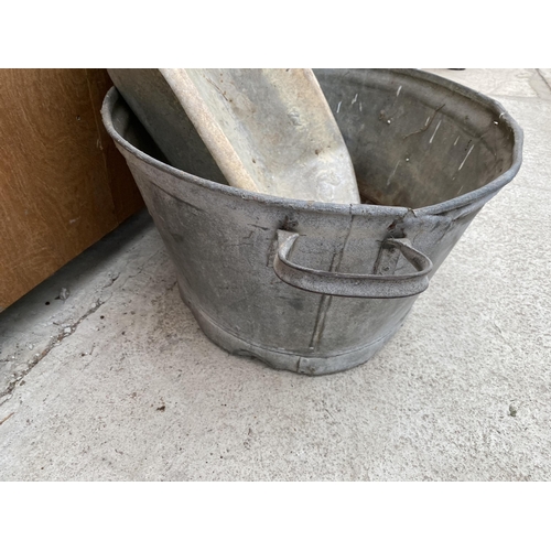 1298 - A TWIN HANDLED TIN BATH AND A FURTHER TIN TROUGH