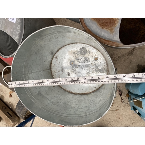 1308 - TWO GALVANISED WATERING CANS AND AN ICE BUCKET