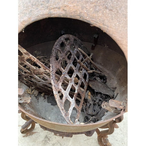 1310 - A CAST IRON CHIMINEA