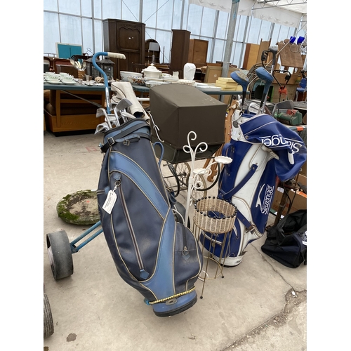 1356 - AN ASSORTMENT OF ITEMS TO INCLUDE VINTAGE GOLF CLUBS AND A CANDLE STAND ETC