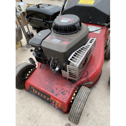 1357 - A CHAMPION PETROL ENGINE LAWN MOWER