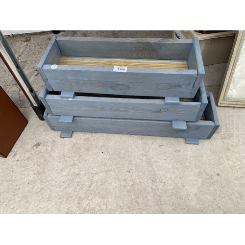 1388 - THREE GRADUATED WOODEN TROUGH PLANTERS