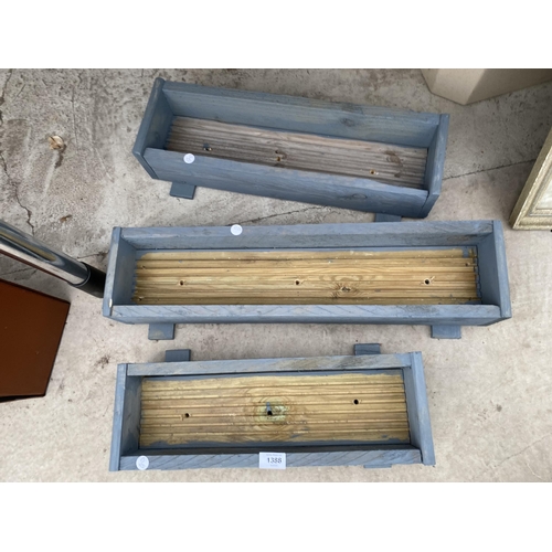 1388 - THREE GRADUATED WOODEN TROUGH PLANTERS