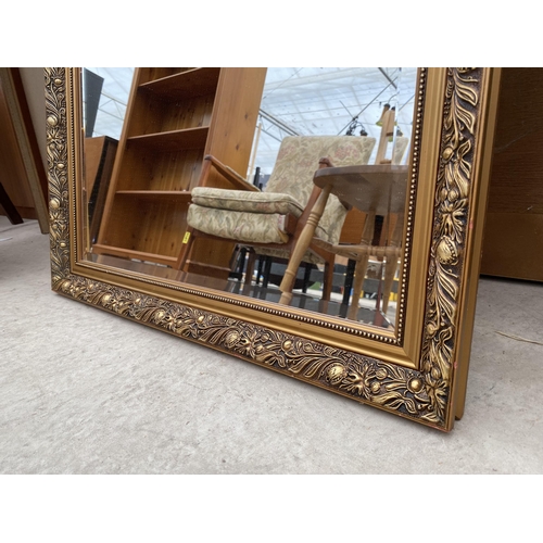 2450 - A  MODERN GILT FRAMED WALL MIRROR, 38X26