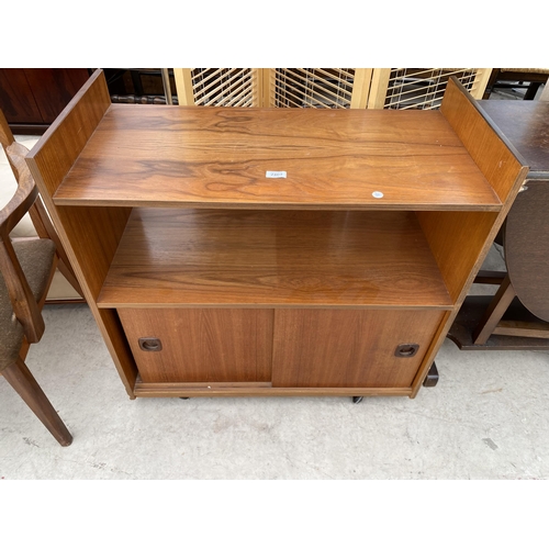 2460 - A RETRO TEAK OPEN BOOKCASE WITH TWO SLIDING DOORS TO BASE, 32