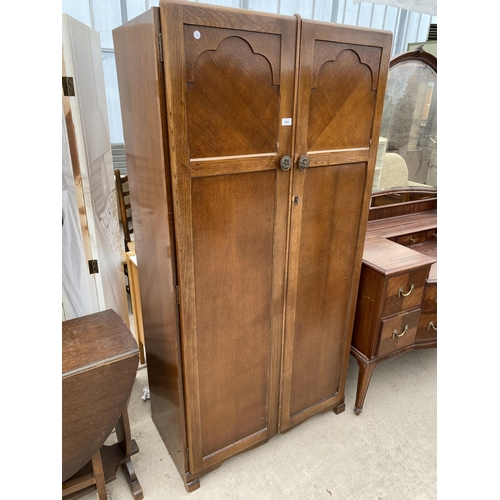 2462 - A MID 20TH CENTURY TWO DOOR WARDROBE, 36