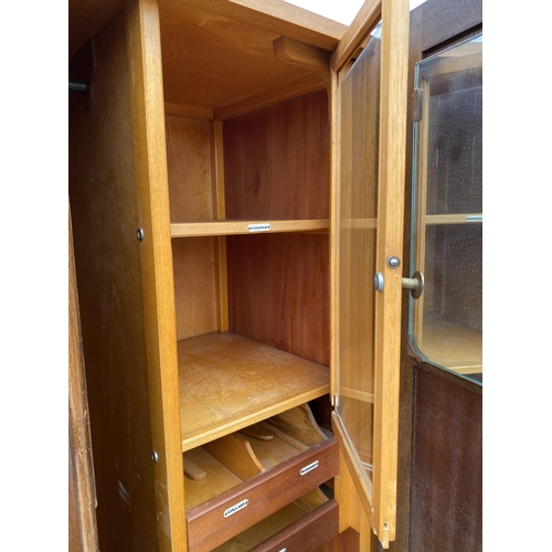 2462 - A MID 20TH CENTURY TWO DOOR WARDROBE, 36