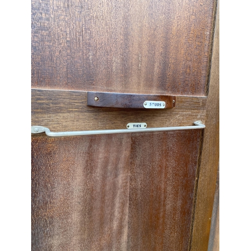 2462 - A MID 20TH CENTURY TWO DOOR WARDROBE, 36