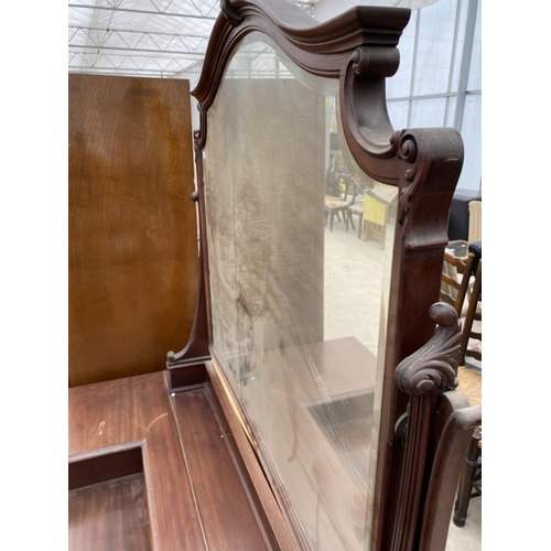 2463 - AN EDWARDIAN MAHOGANY BOWFRONTED DRESSING TABLE ENCLOSING FOUR SHORT, TWO LONG AND THREE JEWELLED DR... 