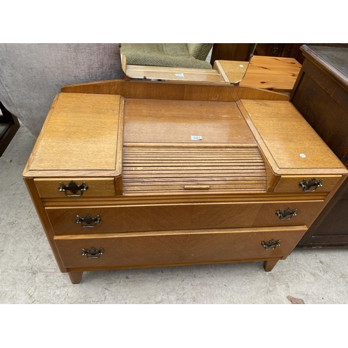 2464 - AN OAK LEBUS (H.L.) DRESSING CHEST OF TWO SHORT AND TWO LONG DRAWERS WITH SMALL ROLL TOP SECTION, 39... 