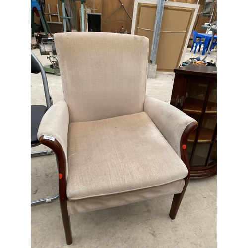 2482 - A PARKER KNOLL FIRESIDE CHAIR MODEL NO. P.K. 749-1014