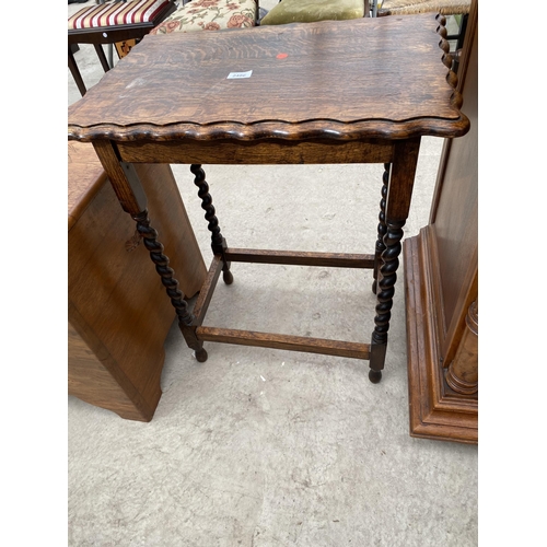 2486 - AN EARLY 20TH CENTURY OAK OCCASIONAL TABLE ON BARLEYTWIST LEGS, 23X16