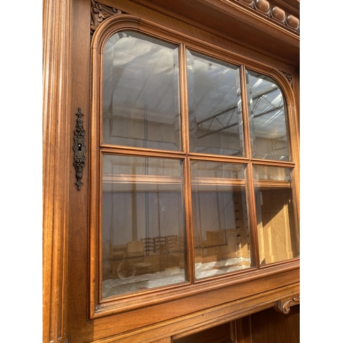 2487 - A VICTORIAN WALNUT DRESSER, THE UPPER PORTION WITH SIDE CUPBOARD, CENTRAL DOOR WITH BEVEL GLASS WITH... 