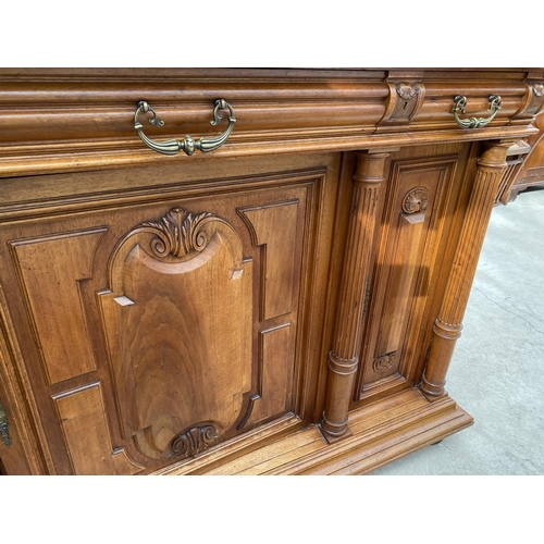 2487 - A VICTORIAN WALNUT DRESSER, THE UPPER PORTION WITH SIDE CUPBOARD, CENTRAL DOOR WITH BEVEL GLASS WITH... 