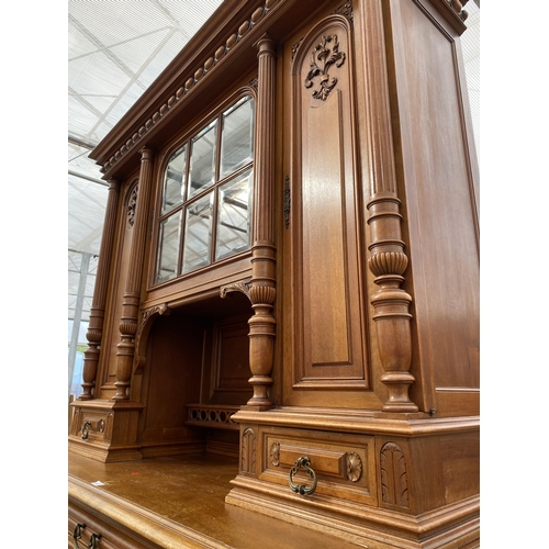 2487 - A VICTORIAN WALNUT DRESSER, THE UPPER PORTION WITH SIDE CUPBOARD, CENTRAL DOOR WITH BEVEL GLASS WITH... 