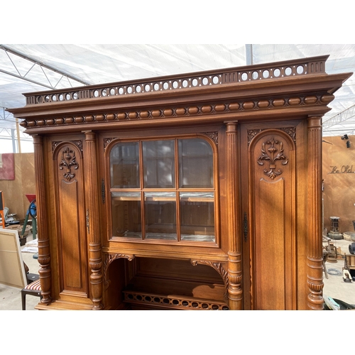 2487 - A VICTORIAN WALNUT DRESSER, THE UPPER PORTION WITH SIDE CUPBOARD, CENTRAL DOOR WITH BEVEL GLASS WITH... 