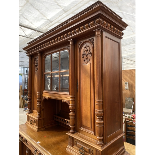 2487 - A VICTORIAN WALNUT DRESSER, THE UPPER PORTION WITH SIDE CUPBOARD, CENTRAL DOOR WITH BEVEL GLASS WITH... 