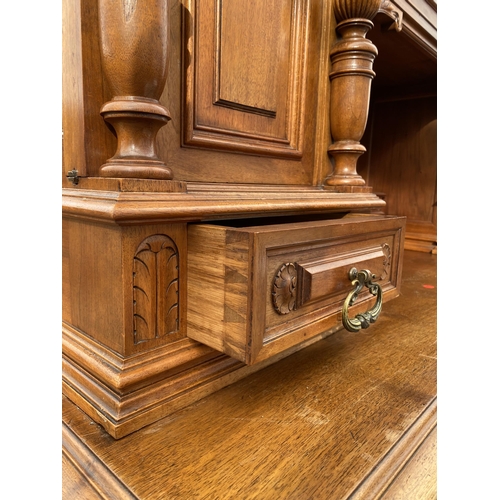 2487 - A VICTORIAN WALNUT DRESSER, THE UPPER PORTION WITH SIDE CUPBOARD, CENTRAL DOOR WITH BEVEL GLASS WITH... 