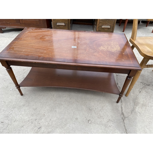 2494 - A MODERN MAHOGANY AND CROSSBANDED TWO TIER COFFEE TABLE, 40X22