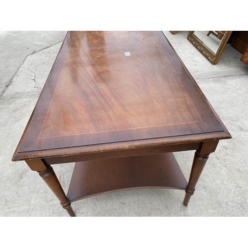 2494 - A MODERN MAHOGANY AND CROSSBANDED TWO TIER COFFEE TABLE, 40X22