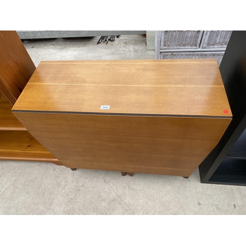 2498 - A MID 20TH CENTURY OAK DROP-LEAF DINING TABLE