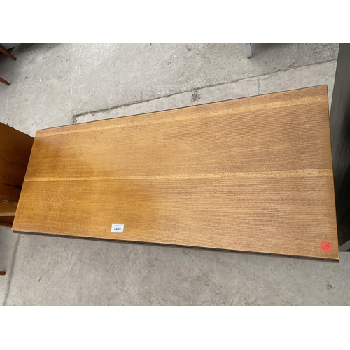 2498 - A MID 20TH CENTURY OAK DROP-LEAF DINING TABLE