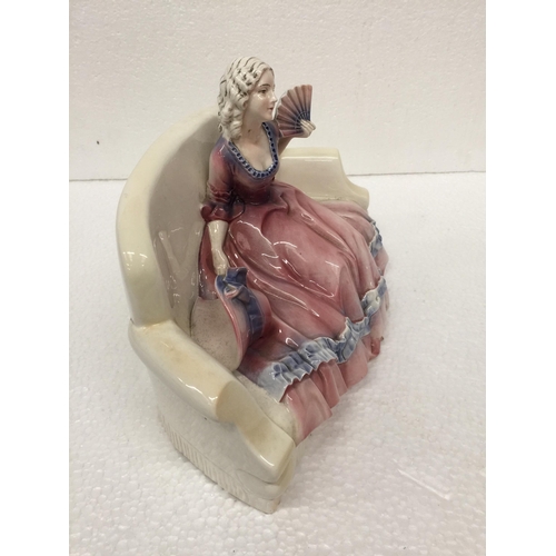 773 - A KAZHUTTE PORCELAIN FIGURINE OF A LADY ON A CHAIR