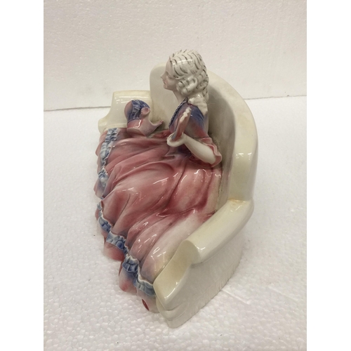 773 - A KAZHUTTE PORCELAIN FIGURINE OF A LADY ON A CHAIR