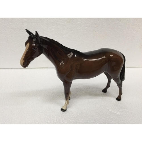 778 - A BESWICK BROWN STANDING HORSE FIGURE