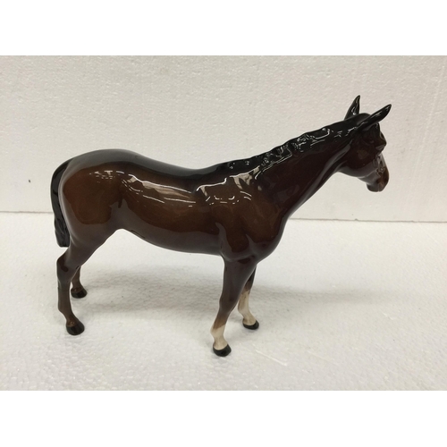 778 - A BESWICK BROWN STANDING HORSE FIGURE