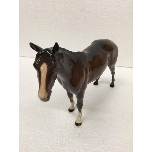 778 - A BESWICK BROWN STANDING HORSE FIGURE