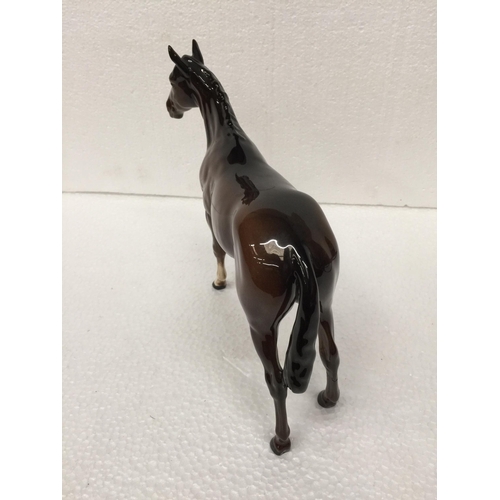 778 - A BESWICK BROWN STANDING HORSE FIGURE