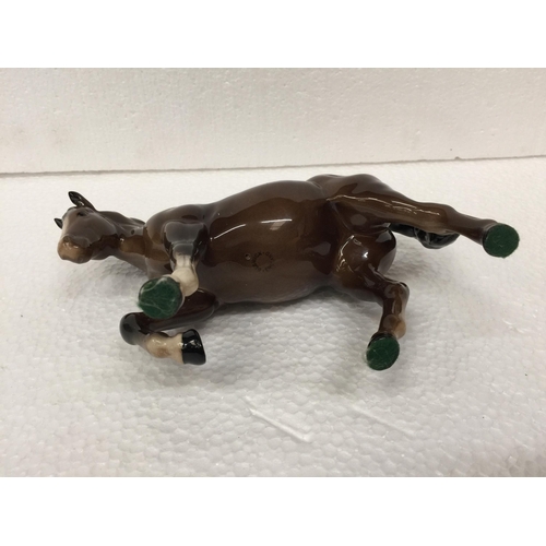 779 - A BESWICK BROWN PRANCING HORSE