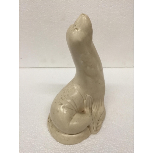 786 - A VINTAGE BESWICK WARE UNPAINTED SEA LION FIGURE