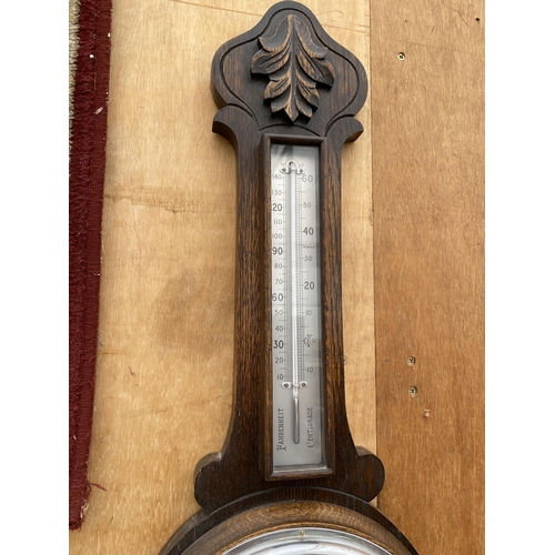 1202 - A VINTAGE WOODEN CASED ANEROID BAROMETER