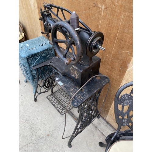 1206 - A VINTAGE INDUSTRIAL SINGER SEWING MACHINE WITH TREADLE BASE