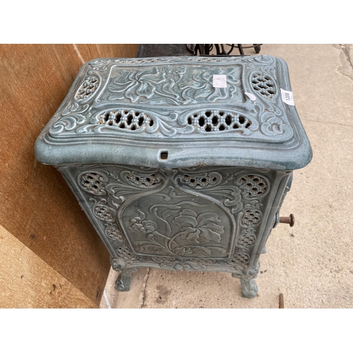 1208 - A VINTAGE DEVILLE AND CO ENAMELED CAST IRON LOG BURNING STOVE (FRONT PLATE REQUIRES ATTENTION - SEE ... 