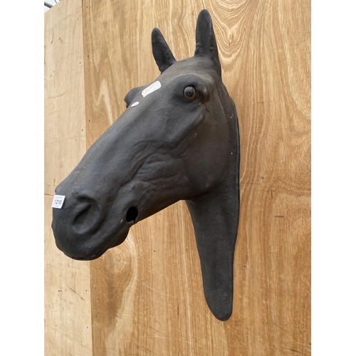 1210 - A BLACK PLASTIC HORSES HEAD