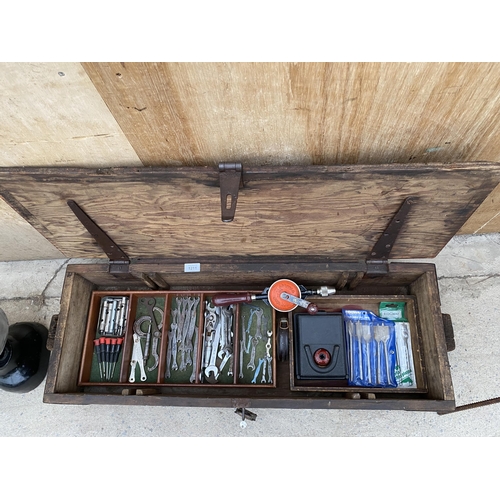 1211 - A VINTAGE WOODEN JOINERS CHEST WITH SECTIONAL STORAGE AND AN ASSORTMENT OF TOOLS TO INCLUDE SPANNERS... 