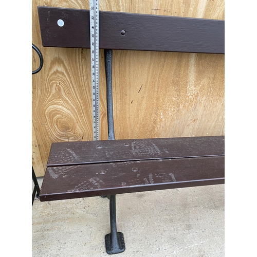 1214 - A WOODEN PLANK BENCH WITH CAST IRON LEG SUPPORTS