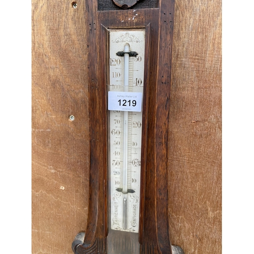 1219 - A VINTAGE WOODEN CASED ANEROID BAROMETER