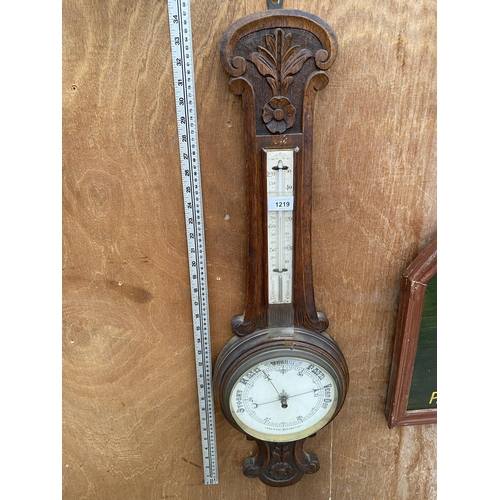 1219 - A VINTAGE WOODEN CASED ANEROID BAROMETER