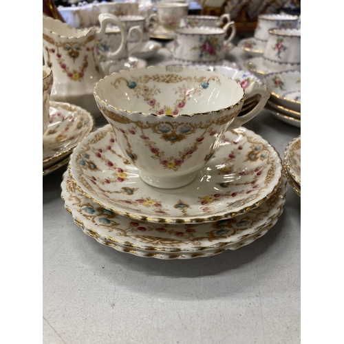 229 - A QUANTITY OF CHINA CUPS, SAUCERS, ETC TO INCLUDE ROYAL ALBERT 'PETIT POINT'