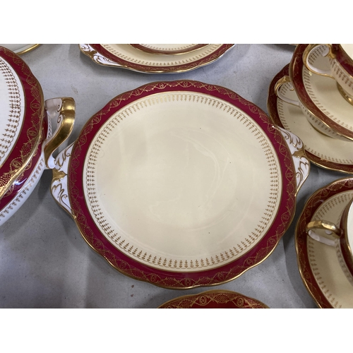 236 - A QUANTITY OF ROYAL ALBERT DINNER WARE WITH A RED BORDER, GOLD FILIGREE ON A CREAM BACKGROUND TO INC... 