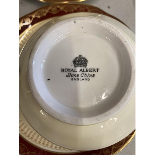 236 - A QUANTITY OF ROYAL ALBERT DINNER WARE WITH A RED BORDER, GOLD FILIGREE ON A CREAM BACKGROUND TO INC... 