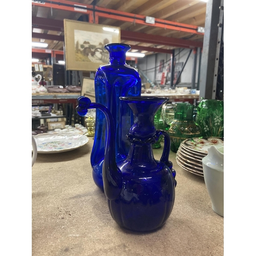 253 - FOUR PIECES OF VINTAGE BLUE GLASS, TWO WITH PONTIL MARKS, TO INCLUDE 'CREMEX SHAMPOOING VASE, ETC