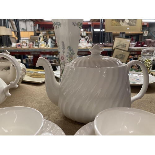 254 - A MINTON WHITE 'FIFE' TEASET TO INCLUDE TWO TEAPOTS, CUPS AND SAUCERS